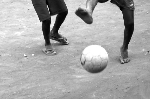 Children Playing Football In Africa