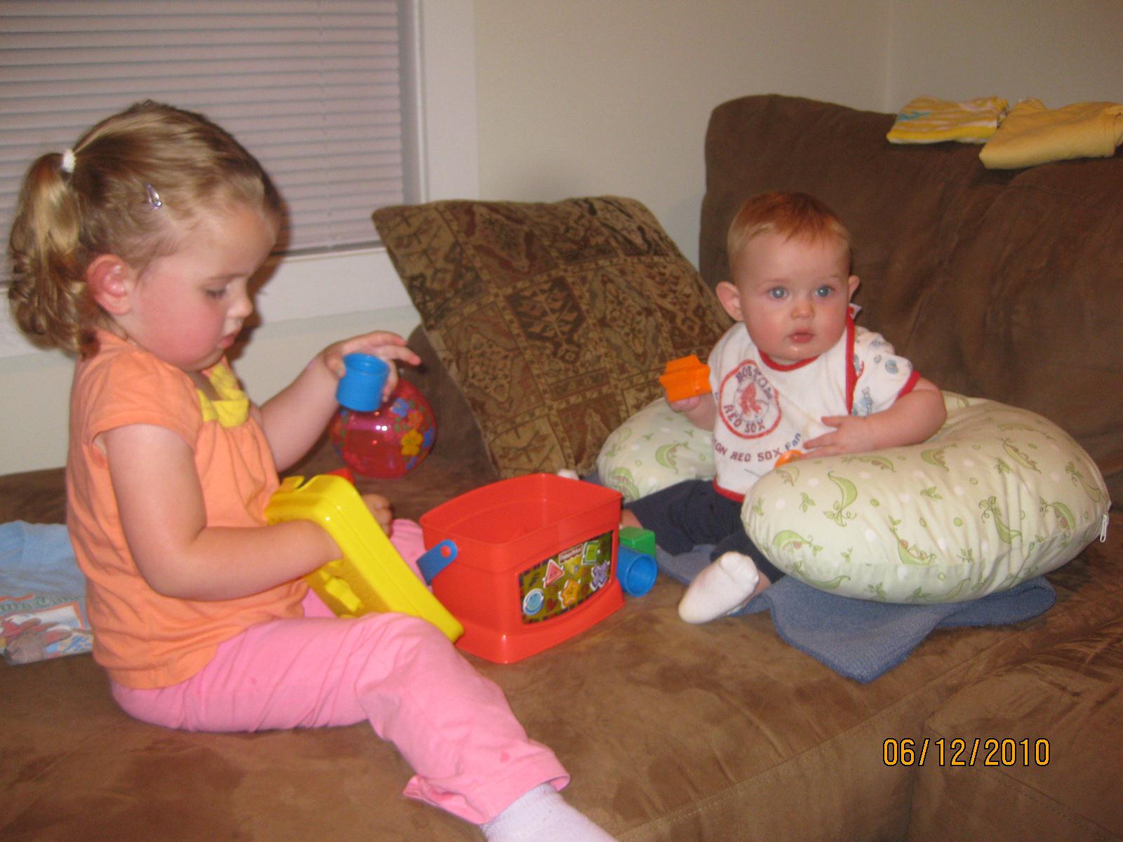 Children Playing With Toys Together